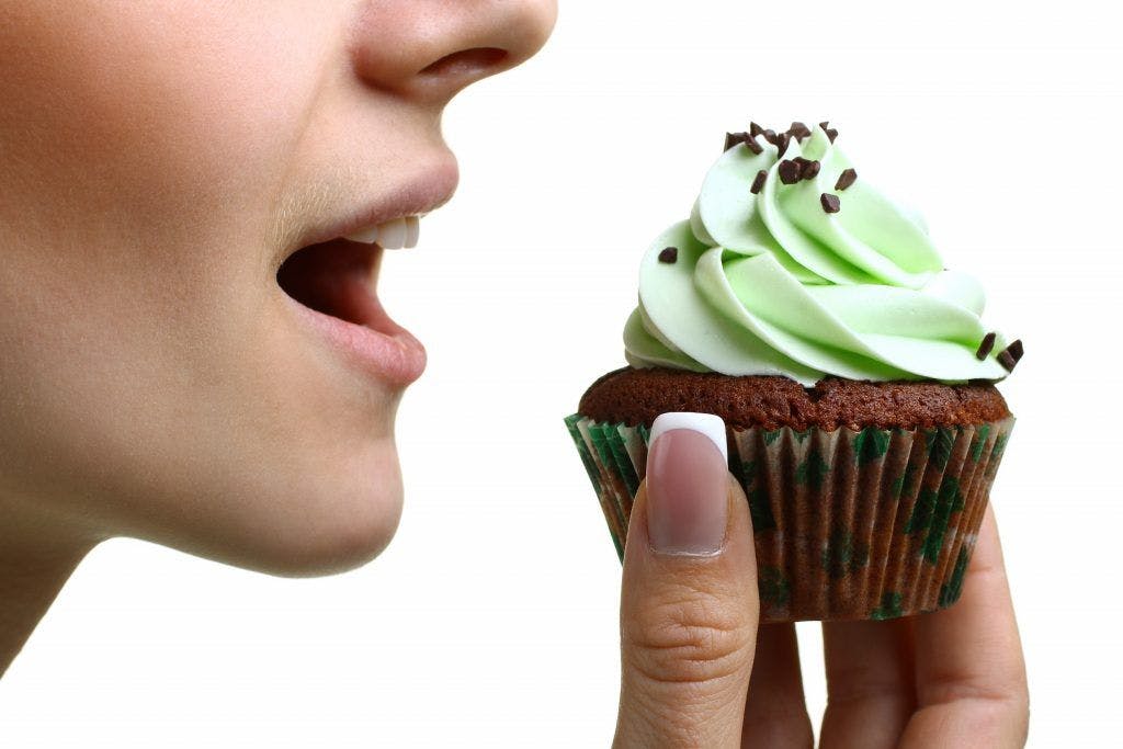eating-cupcake-green-icing